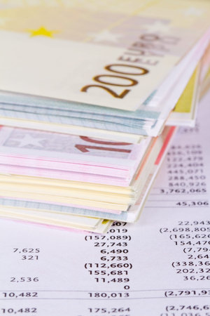 Finance concept, stack of euro money banknotes with graph chart management background.