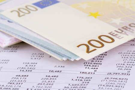 Finance concept, euro banknotes with graph chart management background.の写真素材