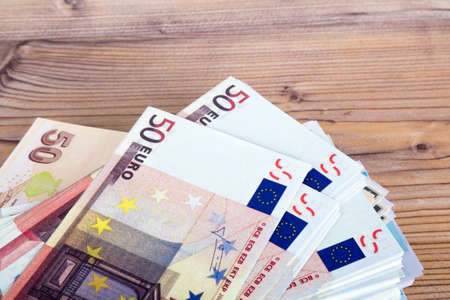 Finance concept, stack of euro banknotes and cash money.の写真素材