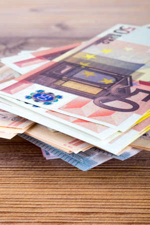 Finance concept, stack of euro banknotes and cash money.の写真素材