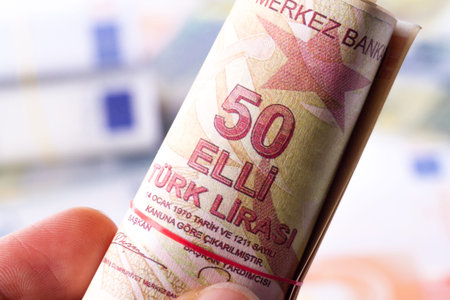 Stack of banknote with money consuming.