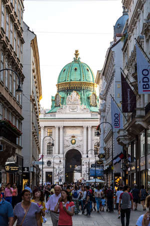VIENNA, AUSTRIA - SEPTEMBER 12, 2016 : View of famous Hofburg Empire Palace in Michaelerplatz on blue sky background. It is Vienna imperial palace and it was built in 13th century.のeditorial素材