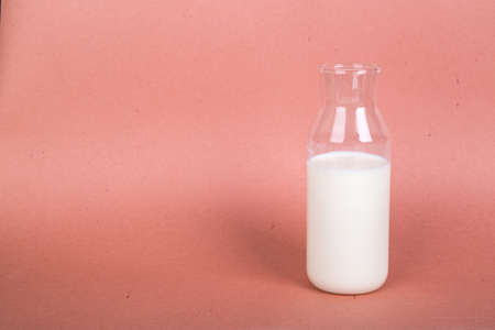 Single milk in bottle on light background.の写真素材