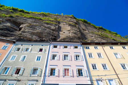 VIENNA, AUSTRIA - SEPTEMBER 13, 2016 : Architectural view of historic Salzburg city in Austria, old town city center on blue sky background.のeditorial素材
