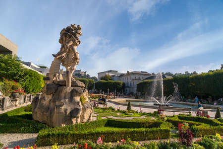 SALZBURG, AUSTRIA - SEPTEMBER 13, 2016 : Colorful beautiful garden view of Mirabell Palace with decorative pools and sculptures. Mirabell Palace is one of the most popular tourist attractions in Salzburg.のeditorial素材