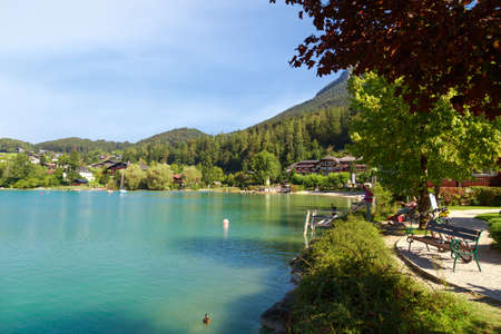 FUSCHL AM SEE, AUSTRIA - SEPTEMBER 14, 2016 : Landscape view of Lake Fuschlsee, Austrian Alpine mountains in touristic town of Salzburg Fuschl am See.のeditorial素材