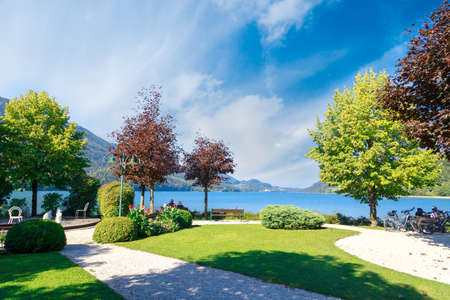 FUSCHL AM SEE, AUSTRIA - SEPTEMBER 14, 2016 : Landscape view of Lake Fuschlsee, Austrian Alpine mountains in touristic town of Salzburg Fuschl am See.のeditorial素材