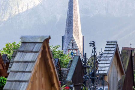 Landscape Hallstatt village view from Beinhaus Ossuary garden, also known as bone house, with historical iconic mountain houses among high Alp Mountains.の写真素材