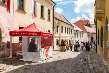 BRATISLAVA, SLOVAKIA - SEPTEMBER 17, 2016 : Historical streets of Bratislava with small tiny houses on cloudy sky background.のeditorial素材
