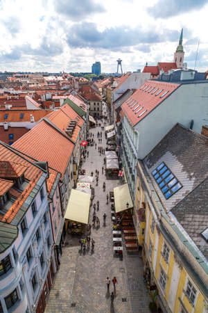 BRATISLAVA, SLOVAKIA - SEPTEMBER 17, 2016 : Panoramic cityscape view of old town of Bratislava from historical clock tower, St. Micheal Gate which is the only city gate preserved from medieval time.のeditorial素材
