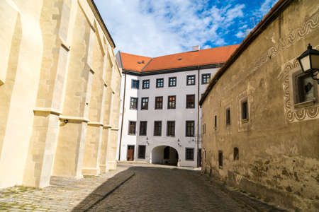 BRATISLAVA, SLOVAKIA - SEPTEMBER 17, 2016 : Historical streets of Bratislava with small tiny houses on cloudy sky background.のeditorial素材