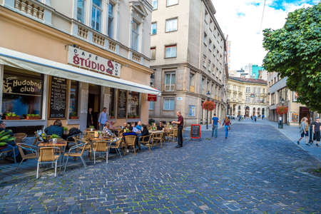 BRATISLAVA, SLOVAKIA - SEPTEMBER 17, 2016 : Historical streets of Bratislava with small tiny houses on cloudy sky background.のeditorial素材