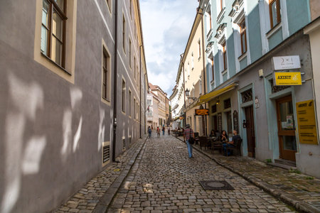 BRATISLAVA, SLOVAKIA - SEPTEMBER 17, 2016 : Historical streets of Bratislava with small tiny houses on cloudy sky background.のeditorial素材