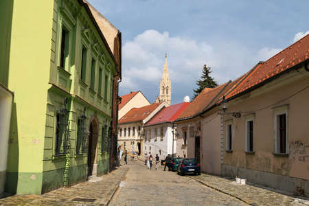 BRATISLAVA, SLOVAKIA - SEPTEMBER 17, 2016 : Historical streets of Bratislava with small tiny houses on cloudy sky background.のeditorial素材