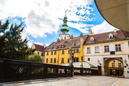 BRATISLAVA, SLOVAKIA - SEPTEMBER 17, 2016 : Historical clock tower of Bratislava, famous Saint Michael Gate which is the only city gate preserved from medieval time.のeditorial素材