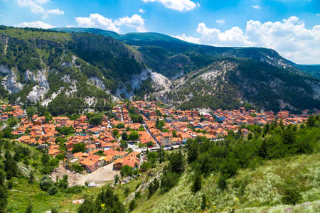 Panoramic cityscape view from historical Kutahya Castle on cloudy blue sky background in Turkey.の写真素材