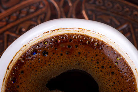 Traditional cup of Turkish coffee with foamの写真素材
