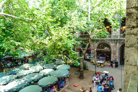 BURSA, TURKEY - JUNE 23, 2018 : View of Koza Han, historical bazaar (caravanserai) in Bursa and built in 1491 where you can find silk shops.のeditorial素材