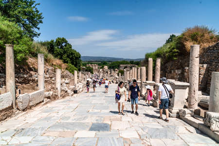 IZMIR, TURKEY - JUNE 2, 2019 : Ruins in historical ancient city Ephesus with people in Izmir, Turkey.のeditorial素材