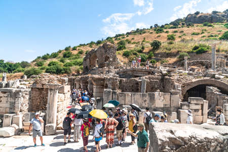 IZMIR, TURKEY - JUNE 2, 2019 : Ruins in historical ancient city Ephesus with people in Izmir, Turkey.のeditorial素材