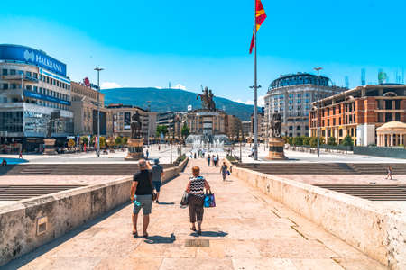 SKOPJE, NORTH MACEDONIA - AUGUST 8, 2019 : City center of Skopje with sculptures and buildings. Skopje is capital city of Macedonia, Fyrom.のeditorial素材