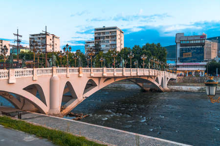 SKOPJE, NORTH MACEDONIA - AUGUST 7, 2019 : City center of Skopje with sculptures and buildings. Skopje is capital city of Macedonia, Fyrom.のeditorial素材
