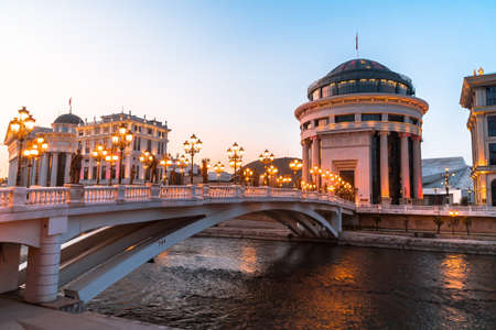 SKOPJE, NORTH MACEDONIA - AUGUST 7, 2019 : City center of Skopje with sculptures and buildings. Skopje is capital city of Macedonia, Fyrom.のeditorial素材