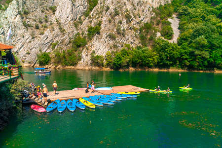 SKOPJE, MACEDONIA - AUGUST 8, 2019 : View of Matka Canyon. Mat is most beautiful touristic attraction near Skopje, people kayaking on landscape.のeditorial素材