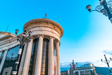 SKOPJE, NORTH MACEDONIA - AUGUST 7, 2019 : City center of Skopje with sculptures and buildings. Skopje is capital city of Macedonia, Fyrom.のeditorial素材