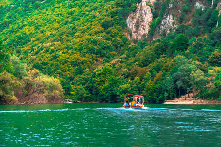 SKOPJE, MACEDONIA - AUGUST 8, 2019 : View of Matka Canyon. Most beautiful with boat tours touristic attraction near Skopje.のeditorial素材