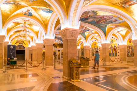 BELGRAD, SERBIA - AUGUST 10, 2019 : Inside view of Saint Sava Cathedral with frescos on wall. This cathedral is one of the biggest Orthodox cathedral in the world.のeditorial素材