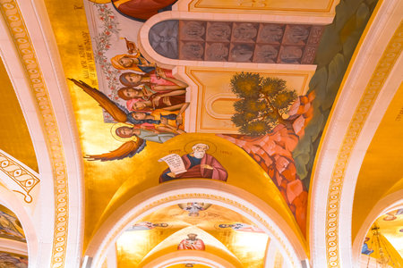 BELGRAD, SERBIA - AUGUST 10, 2019 : Inside view of Saint Sava Cathedral with frescos on wall. This...