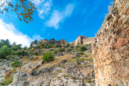 Landscape view of Red Tower with marina. Alanya is popular destination in south of Turkey.