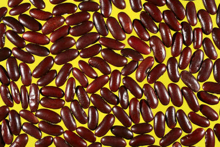 Beans. Close-up on a yellow background.の写真素材