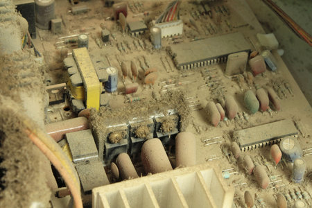 Monitor the computer disassembled. Electronic payments in the dust.の写真素材