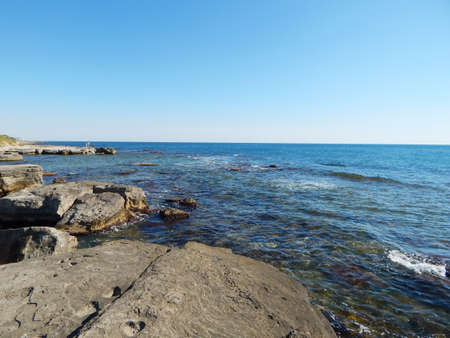 Water splashes around the stone. Caspian Sea. Kazakhstan.の写真素材