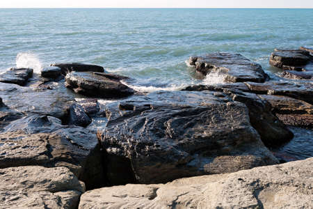 Rocky shore of the Caspian Sea. Winter season.の写真素材