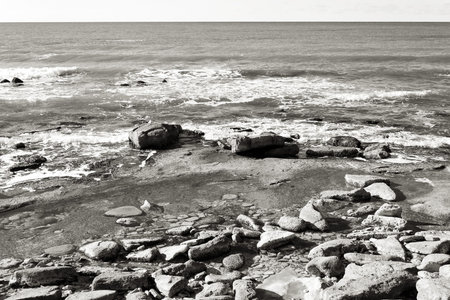 Rocky shore of the Caspian Sea. Winter season.の写真素材