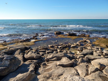 Rocky shore of the Caspian Sea. Winter season.