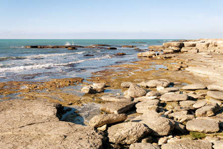 Rocky shore of the Caspian Sea. Winter season.の写真素材