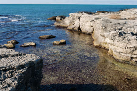 Rocky shore of the Caspian Sea. Winter season.の写真素材