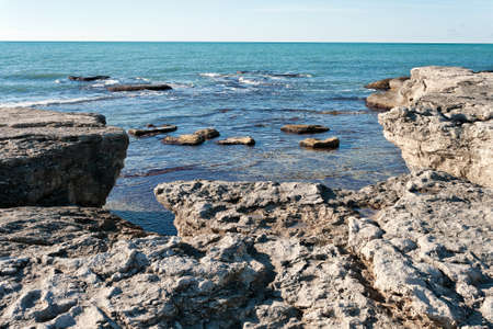 Rocky shore of the Caspian Sea. Winter season.の写真素材