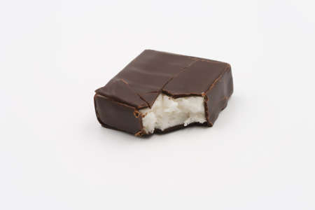 Snack chocolate candy with white stuffing. On a white background.の写真素材