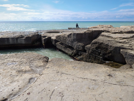 Rocky shore of the Caspian Sea. The texture of the stone.