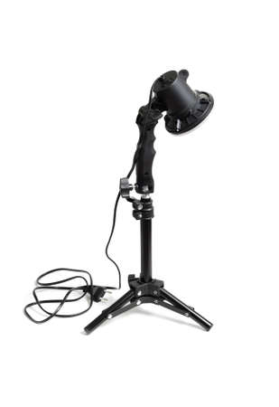 Compact LED light for photography. Isolated on white background.の写真素材