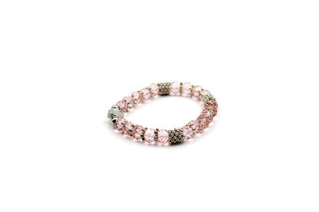 Female beaded bracelet. Isolated on white backgroundの写真素材