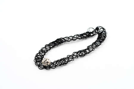 Women's decorative bracelet on the wrist. On a white background.の写真素材