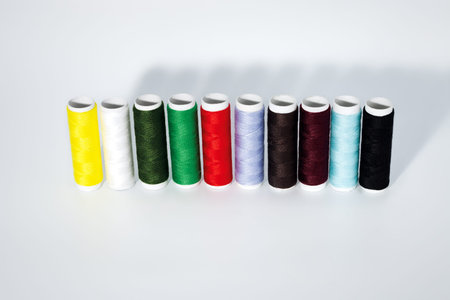 Set of colored thread. Close-up on a white background.の写真素材