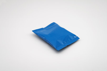 Blue small package. Close-up. On white background.の写真素材