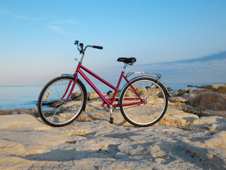 Bicycle on the rocky coast of the sea. Rocky coast of the Caspian Sea. Mangistau region. Kazakhstan. 23 September 2020 year.の写真素材